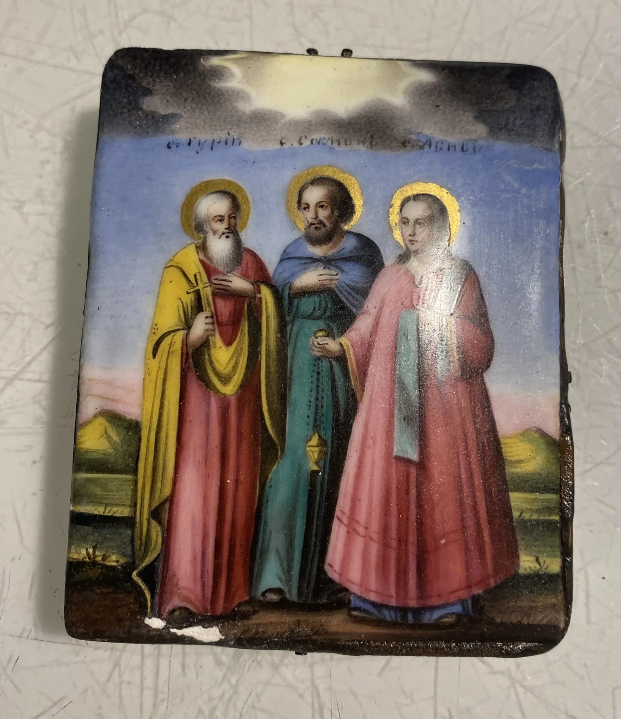 Icon with three saints. Before restoration.
