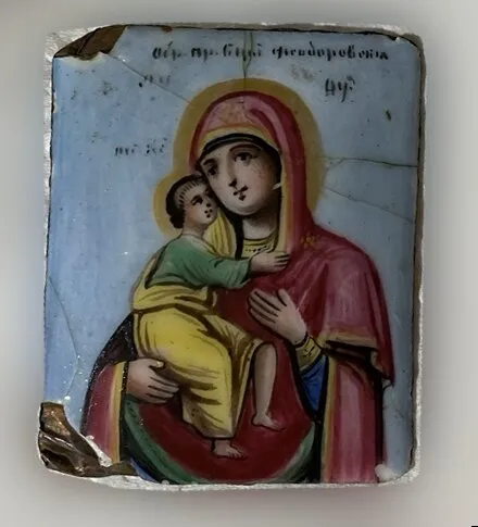 Virgin and Child. Before restoration. Damage along the edges.