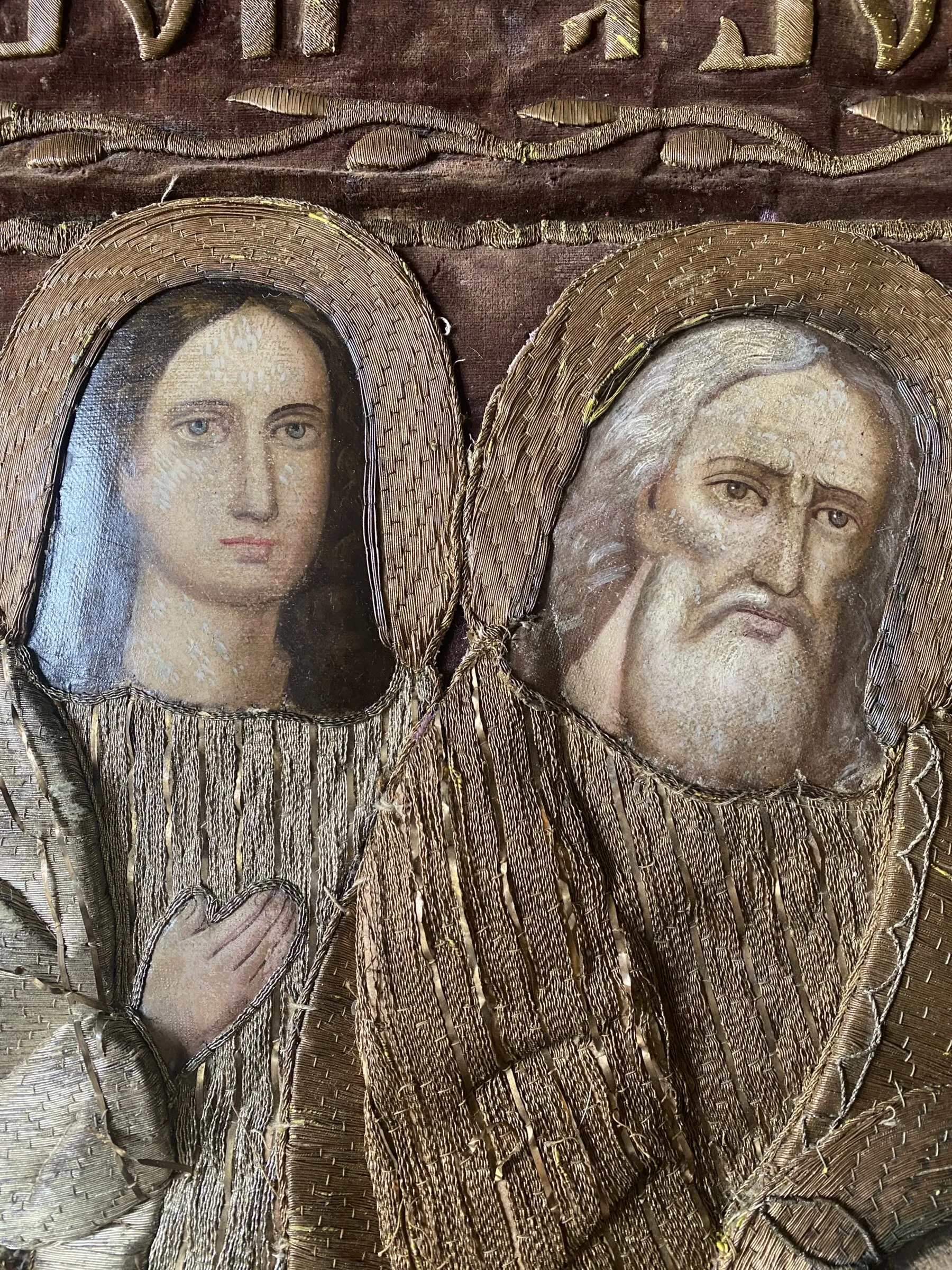 Painted inserts with the faces of the mourners. Paired detail.