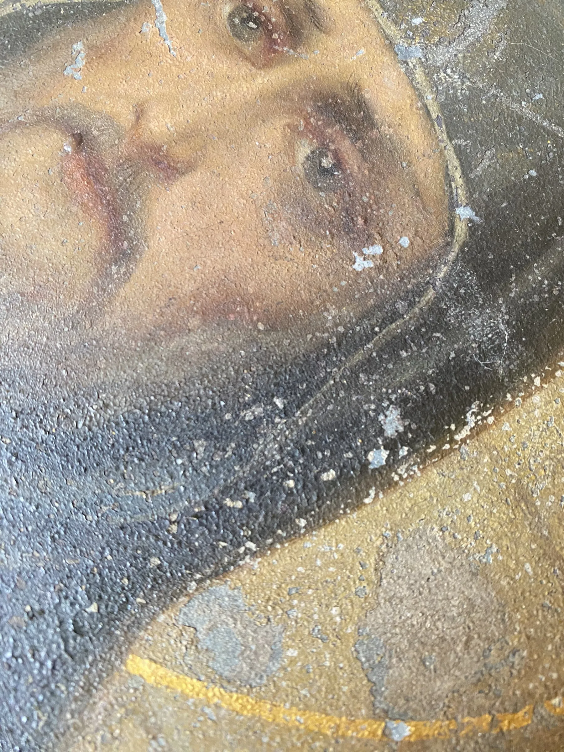 Before restoration. Detail of the face of Athanasius: surface condition.